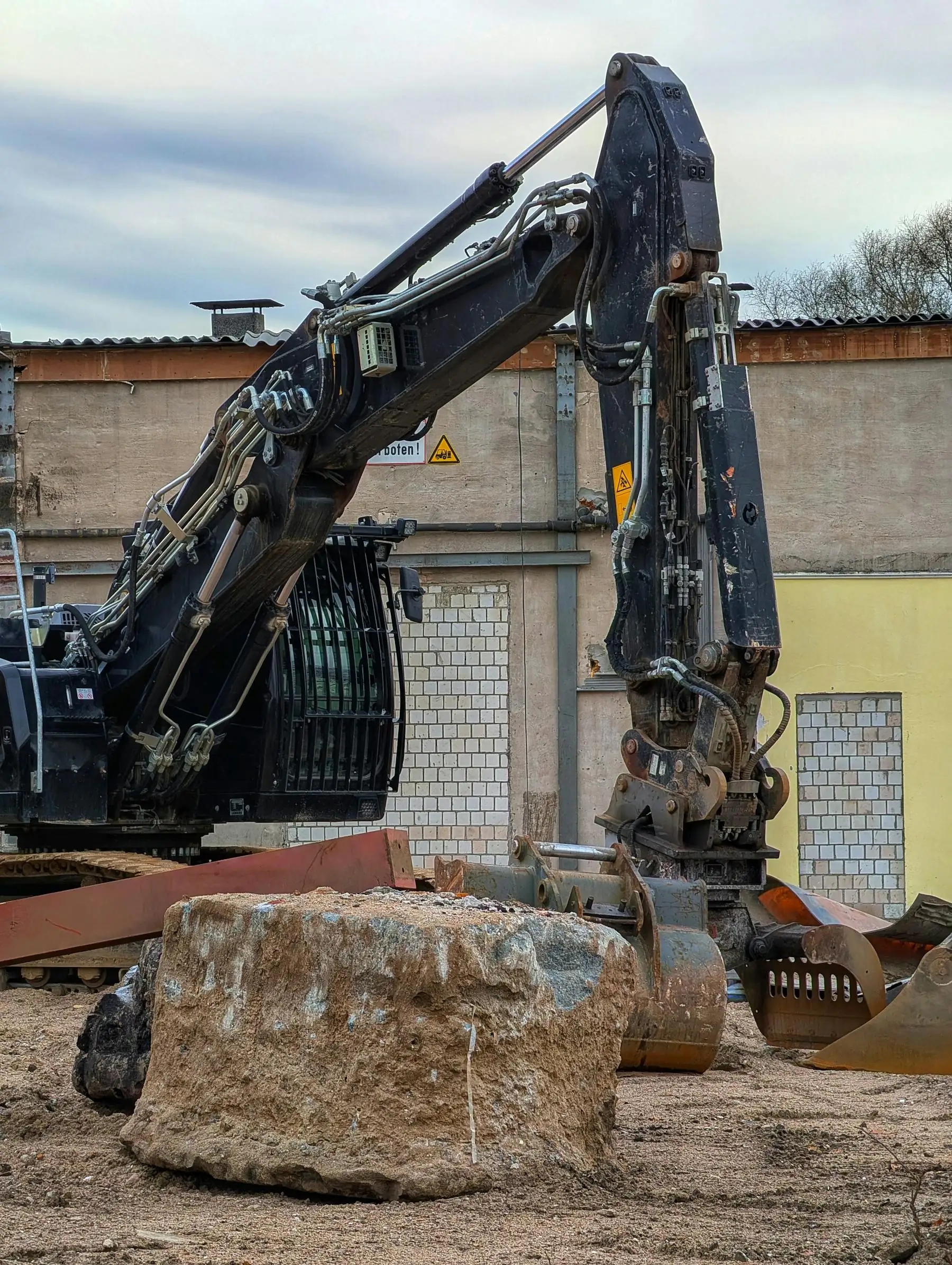 Heavy demolition debris being cleared